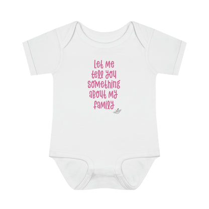 "Let me tell you something about my family" onesie (pink lettering)