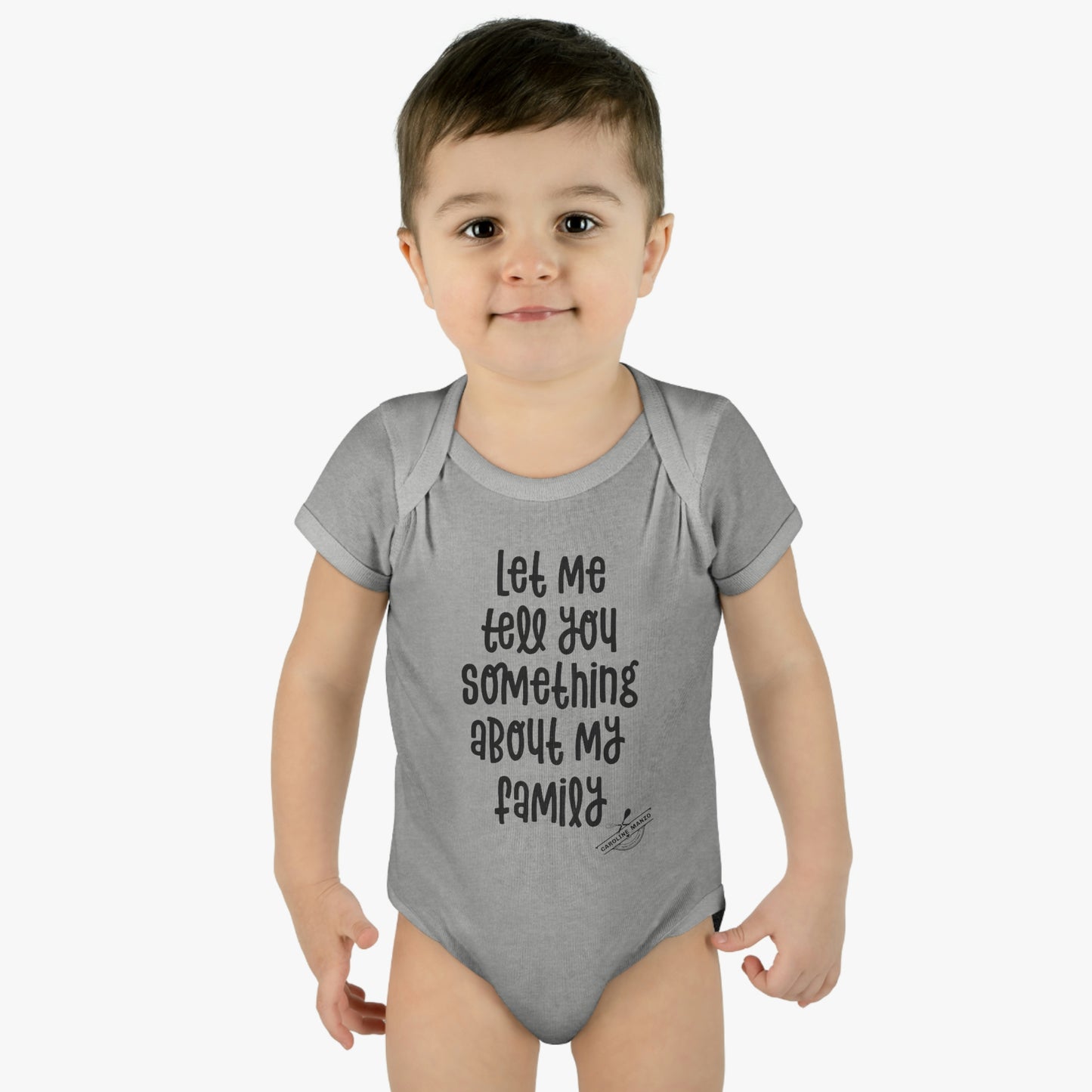 "Let me tell you something about my family" baby onesie (black lettering)